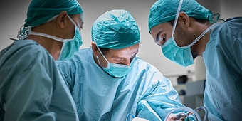 3 Surgeons providing surgical care
