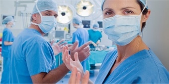 Nurses preparing to conduct operation
