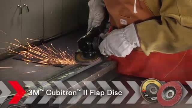 A person using a grinder
