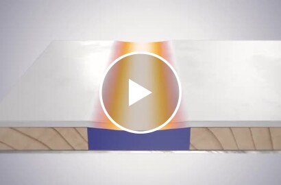 Video still showing a sheet of material bonded to pieces of wood with different adhesives