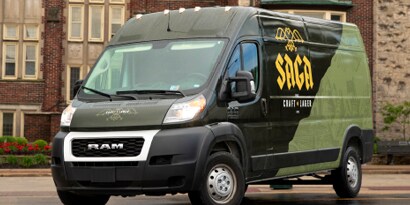 black and green commercial van with SAGA branded graphics