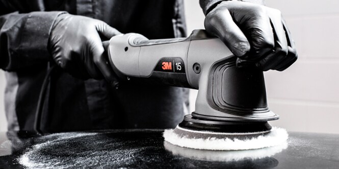 A technician uses the 15mm Random Orbital Polisher to detail a vehicle.
