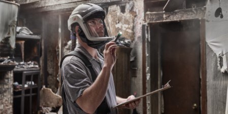 Arson Investigator using a 3M Versaflo Heavy Industry PAPR Kit TR-600-HIK
