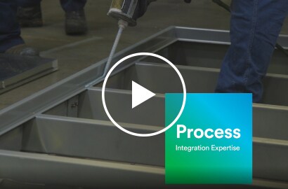 Liquid adhesive application to a frame, with text &ldquo;Process &ndash; Integration Expertise&rdquo;