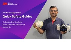 A person holding a face mask