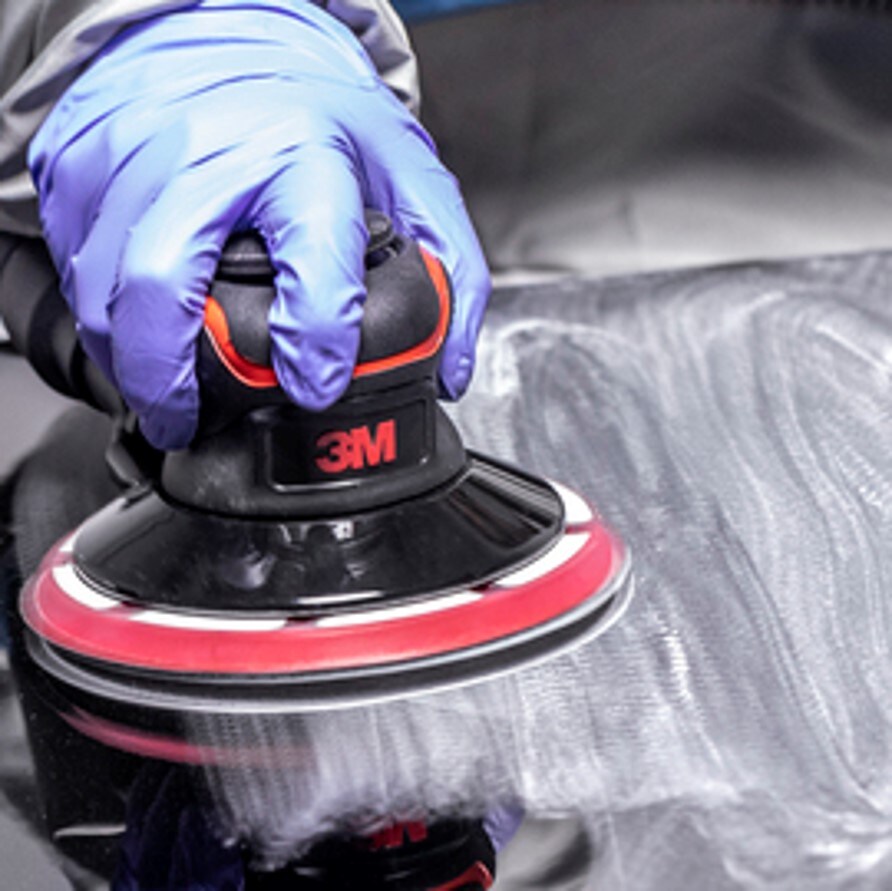 Technician using 3M™ Trizact™ Hookit™ Foam Abrasive Disc and Festool Random Orbit Sander