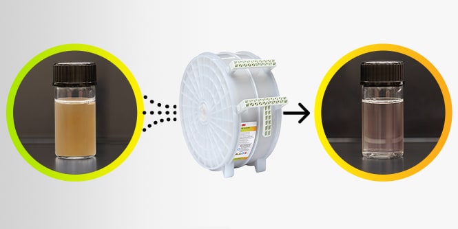 Solution being clarified by 3M fiber chromatographic capsules into a vial
