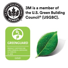 A leaf with droplets of water on it under a U.S. Green Building Coucil Member badge and next to a GreenGuard Gold certification.