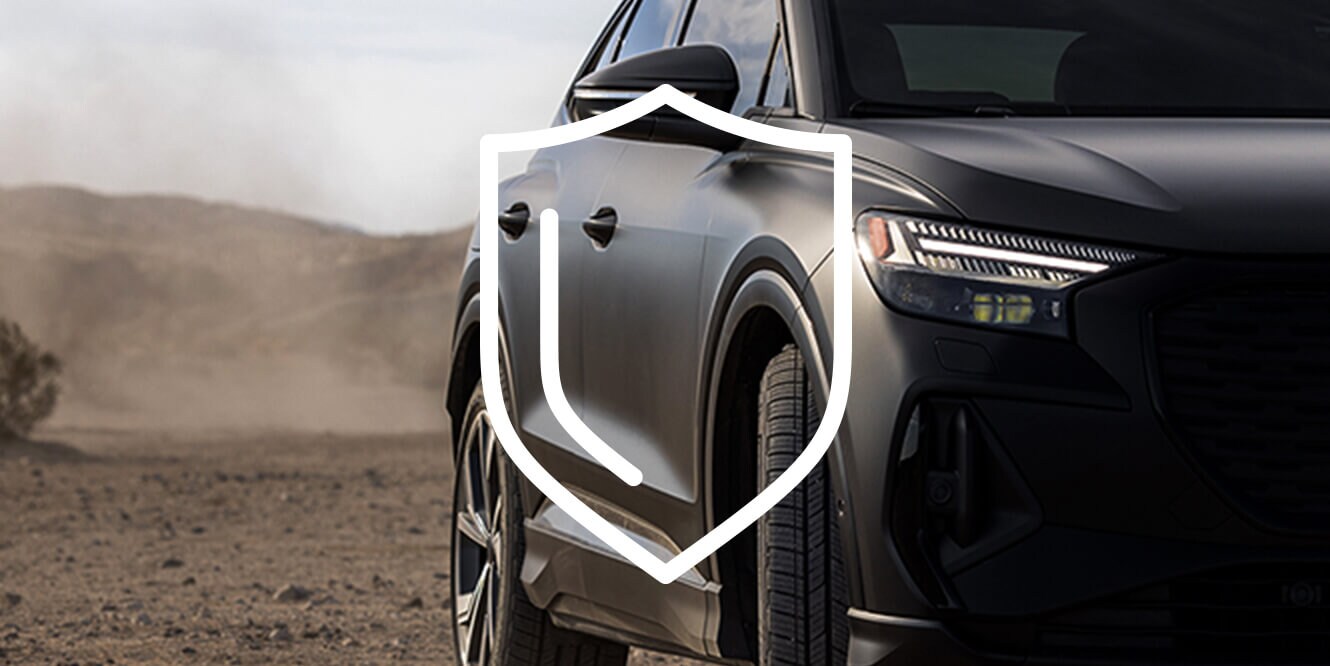 Front bumper  of EV car matte gray wrap film and paint protection film with shield icon
